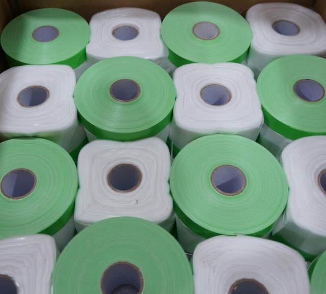 Cinta adhesiva con película protectora para pintar casas